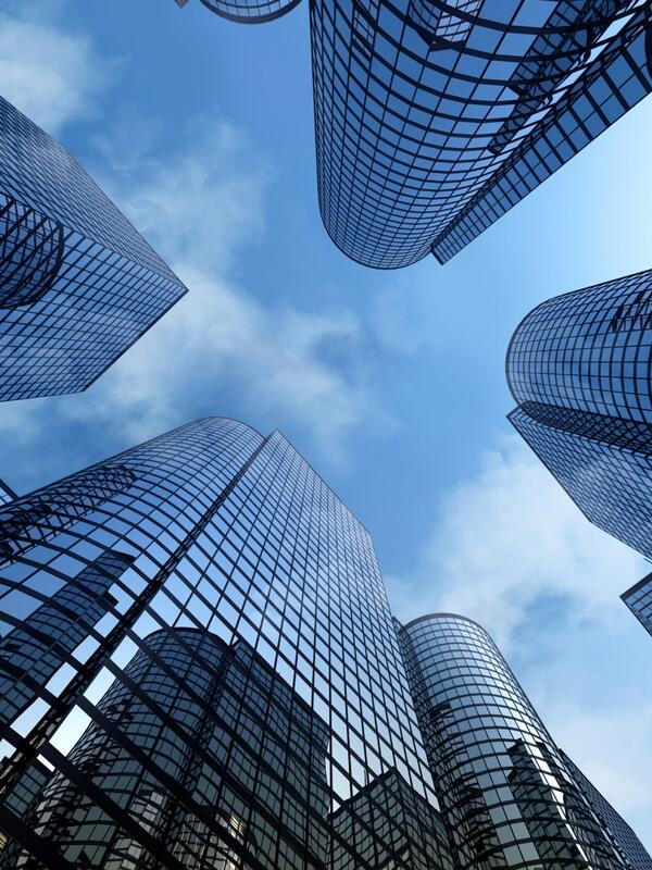 skyscrapers reflecting each other on their windows